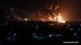 Several explosions heard in Luhansk and oil depot catches fire – video