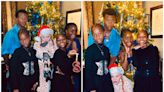 Madonna’s 10-year-old twin daughters wear corsets and high heels for family Christmas photo