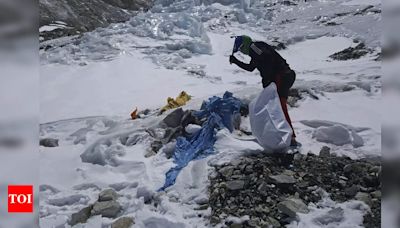 Mount Everest's highest camp littered with frozen garbage and decade old bodies - cleanup is likely to take years - Times of India