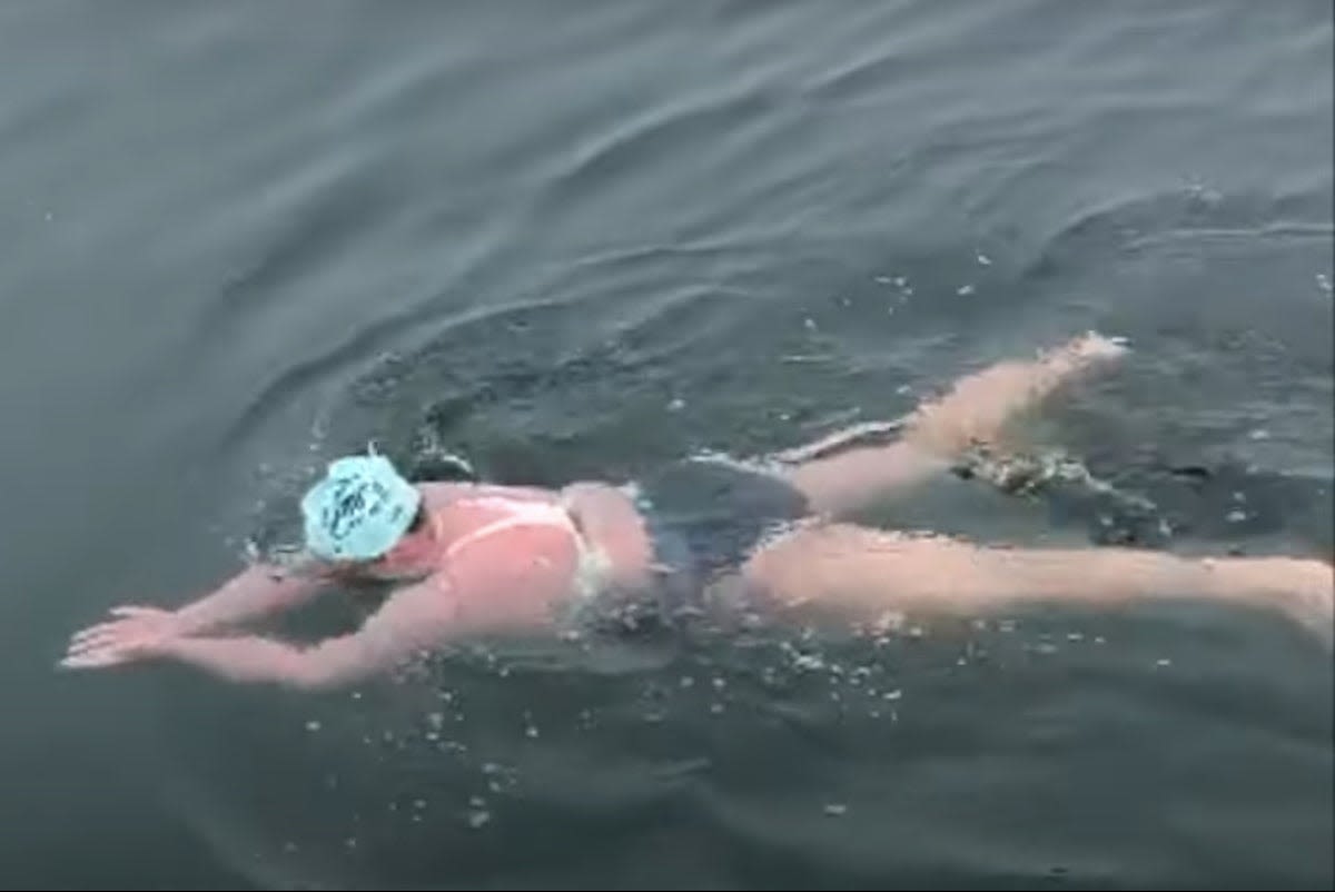 Grandmother makes history as first person to complete 17-hour swim through shark-infested waters