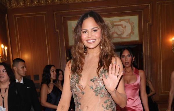 Chrissy Teigen Steps Out in Floral Naked Dress After Skipping the 2024 Met Gala