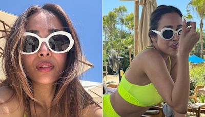 Malaika Arora Looked As Bright As A Neon Light In A Dolce And Gabbana Swim Set In Spain