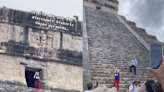 Tourist mobbed by onlookers after climbing ancient Mayan pyramid in Mexico
