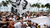 ‘His legacy will outlive us all’: Pele takes final journey as thousands attend funeral