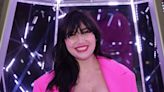 Pregnant Daisy Lowe shows off her bump in bright pink outfit at Claridge’s Christmas tree party