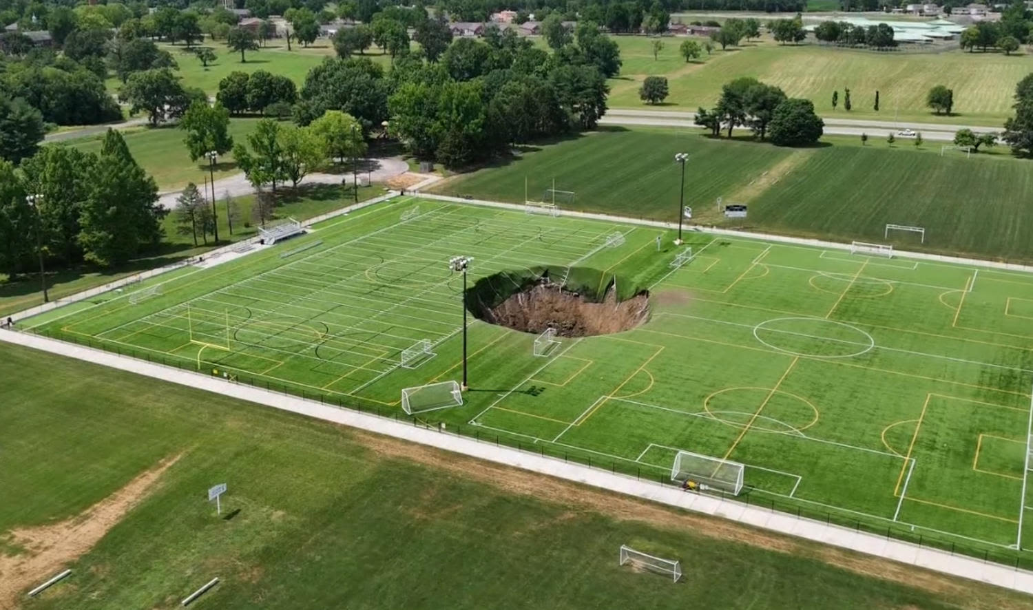 Sinkhole swallows soccer field in Illinois in shocking video