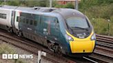 Rail worker in near miss on West Coast Main Line - report