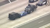 Police standoff on 91 Freeway in Orange County ends, massive traffic jam still in place