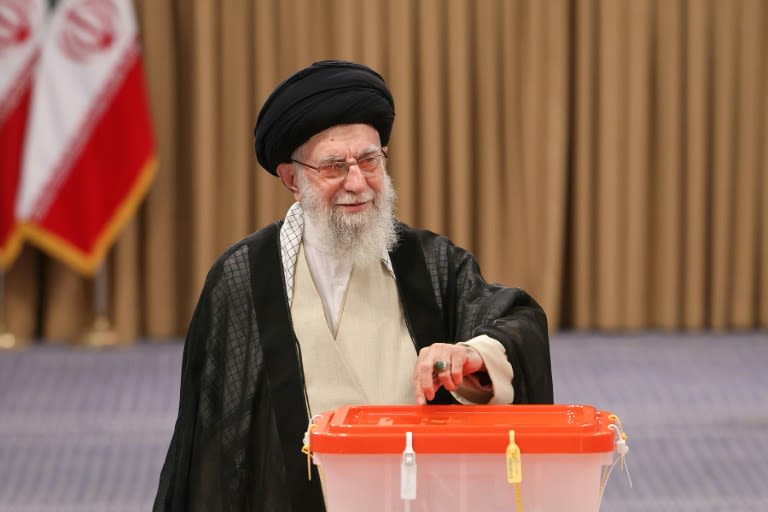 Calling for better ties with West, Iran reformist wins presidency