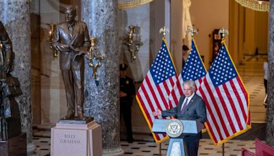 The late Rev. Billy Graham is immortalized in a statue unveiled at the US Capitol