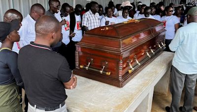 Slain Ugandan Olympian buried with full military honours