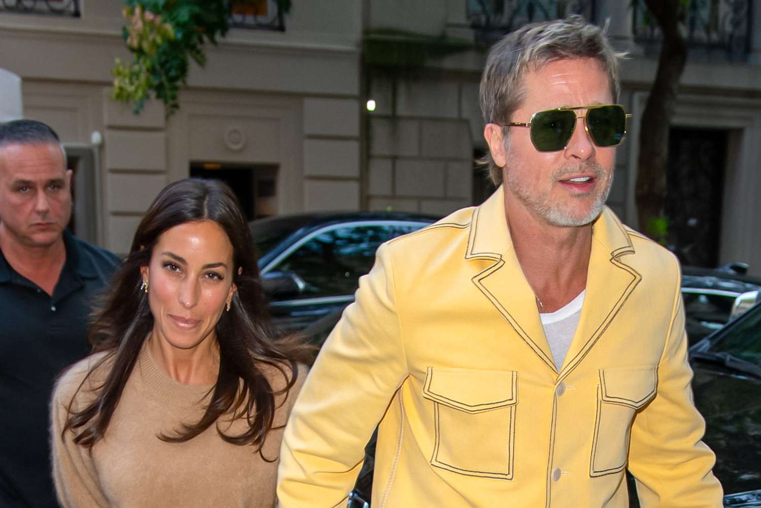 Brad Pitt Steps Out with Girlfriend Ines de Ramon in Yellow Suit with Flared Legs