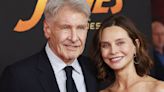 Harrison Ford and Calista Flockhart sweetly hold hands at film premiere