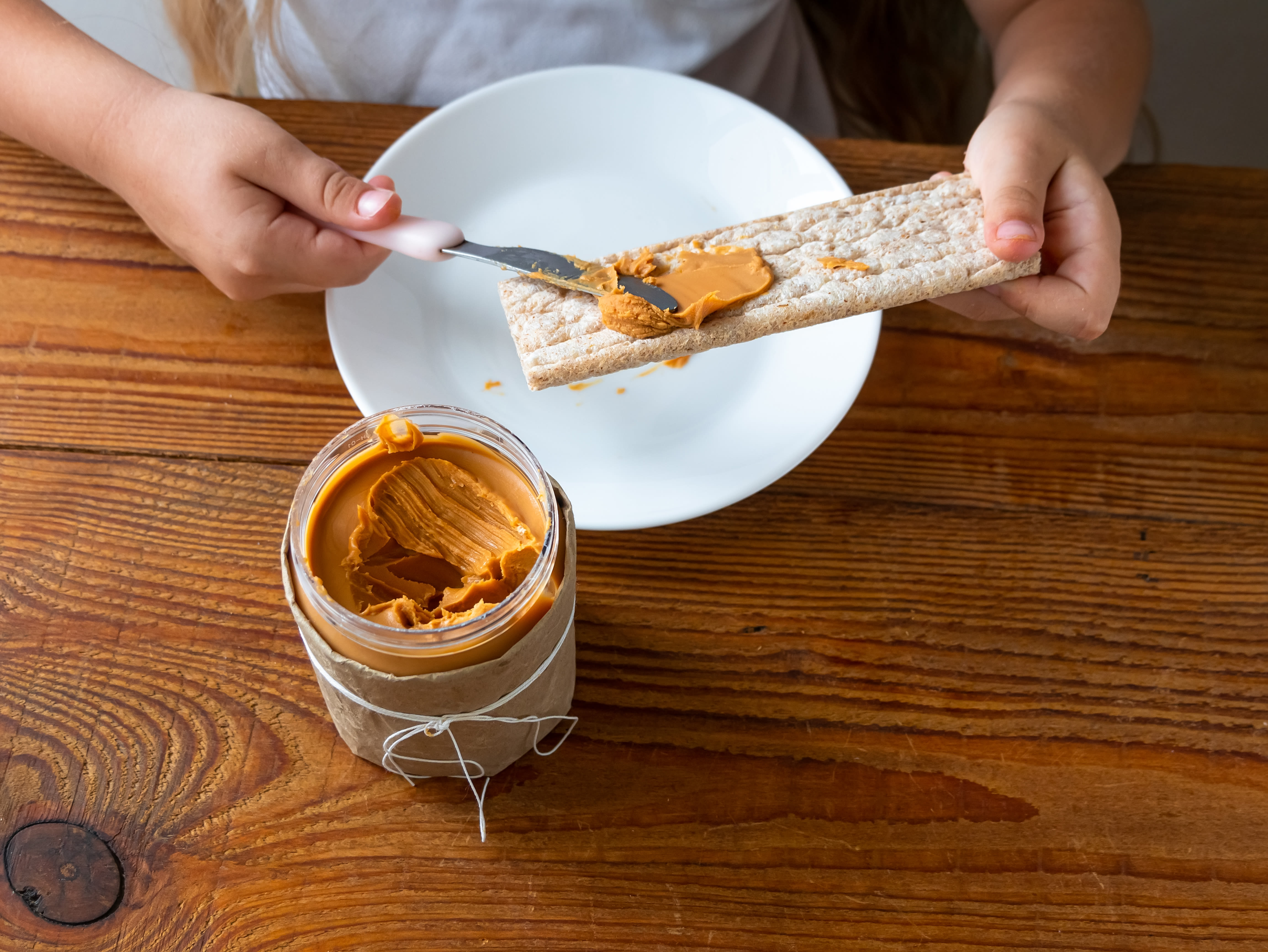 Feeding your child peanuts from a young age can help reduce allergies later, new study claims