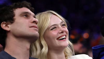 Elle Fanning and boyfriend Gus Wenner cheer the New York Knicks to a late victory at Madison Square Garden as actress enjoys a date night while filming Bob Dylan biopic