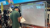 Some airports were forced to use whiteboards to handwrite flight information due to the global IT outage