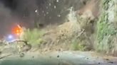 Moment landslide hurtles down major US highway blocking road