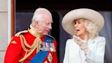 Queen Camilla's three-word exchange with King Charles after appearing to hurry him off the balcony at Trooping the Colour