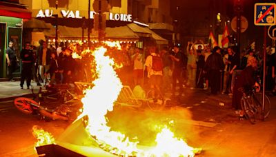 Violent protest against far-right National Rally erupt in Paris as Macron urges tactical voting