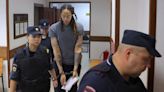 In handcuffs and in tears, Griner says: 'I love my family'