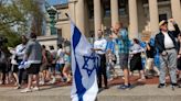 Columbia University begins suspending students after warning to clear out of protest camp