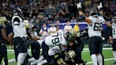 Travis the TD-maker: Jaguars Etienne gets into the end zone twice in the first half vs. Saints