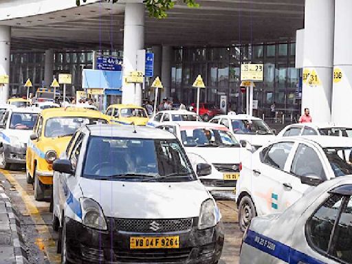 Fliers face taxi tout ordeal: Airport chaos same as before, cops await order