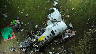 Brazilian authorities recover all bodies from passenger plane which crashed in residential area