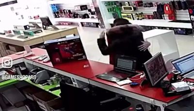 Heartwarming Video: Clerk Hugs Customer Celebrating Long-Awaited PS5 Buy