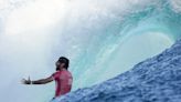 Jubilation and disappointment seen on shore as Paris Olympics surfing eliminations begin in Tahiti