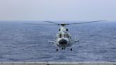 China deploys military helicopter as dispute with US ally escalates