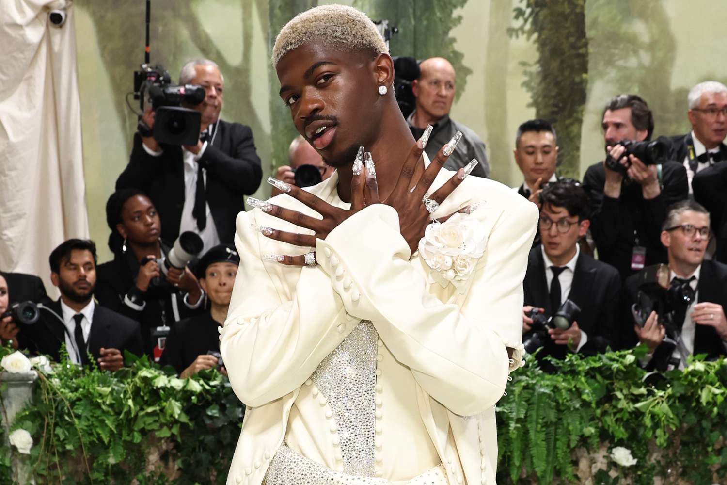 Lil Nas X Rocks Sparkly Suit, Blond Hair and Extra-Long Acrylic Nails for 2024 Met Gala