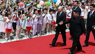 Rare pictures inside North Korea show streets decked out with Putin posters