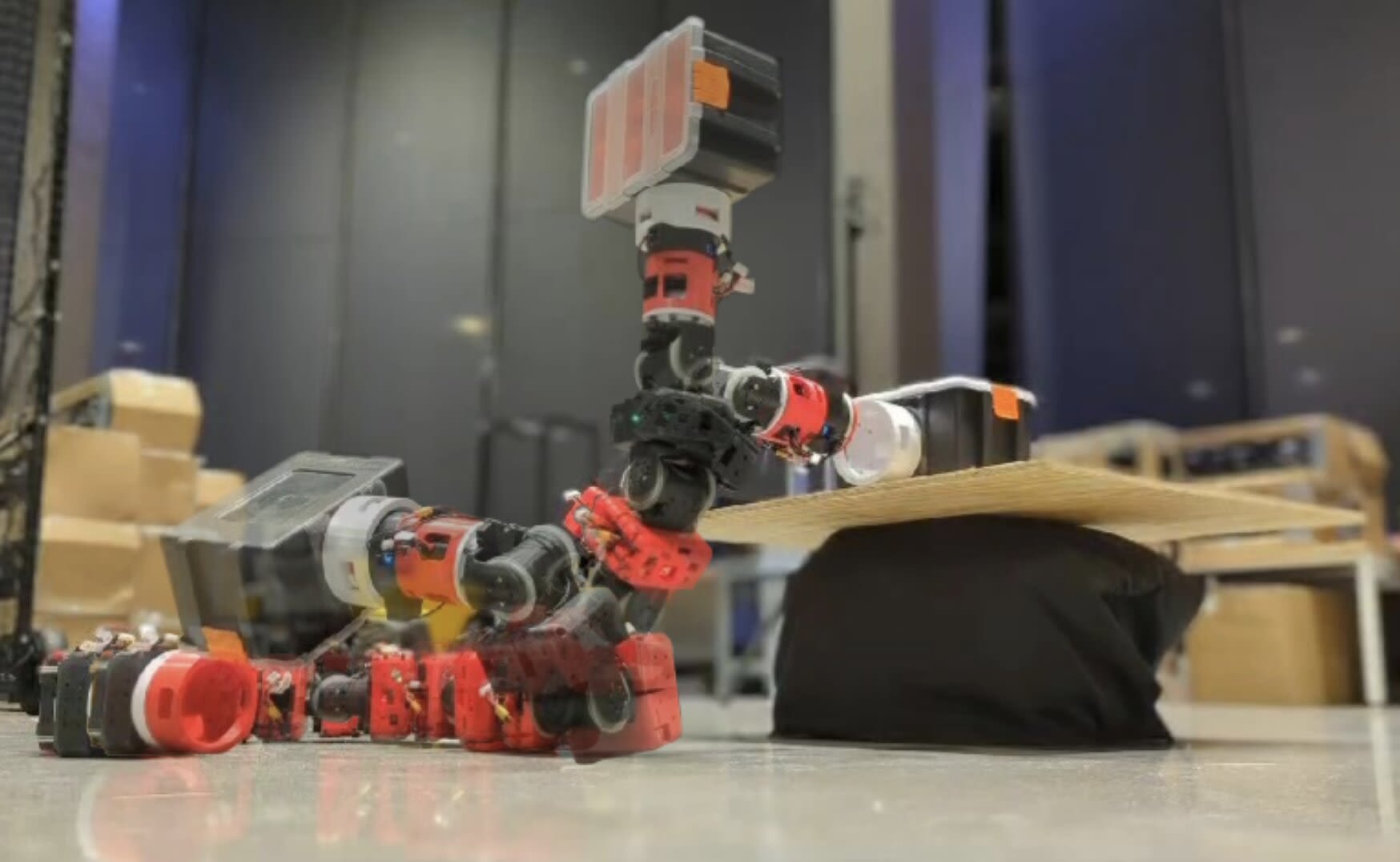 An approach to enable both locomotion and manipulation in a snake-inspired robot