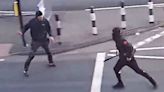 Terrifying moment thugs armed with machetes ambush dad outside KFC