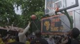 Prince Harry shows off basketball skills as Meghan watches on during visit to Nigeria