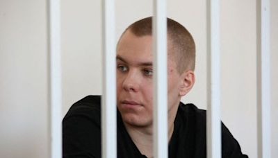 Russian man jailed for burning Koran charged with treason