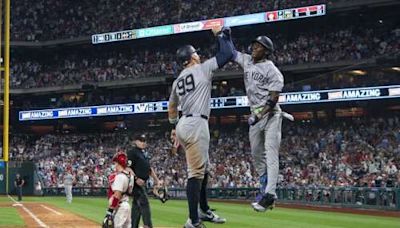 Chisholm’s second straight 2-homer game helps Yanks top Phils 7-6 in 12 innings