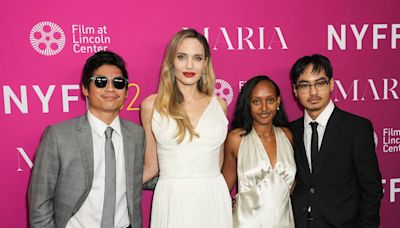 Angelina Jolie supported by children Pax, Zahara and Maddox at Maria premiere