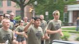 Officers, deputies run Special Olympics torch to Hall of Justice