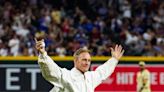 Beekeeper Matt Hilton throws out first pitch after bees delay Dodgers-Diamondbacks game