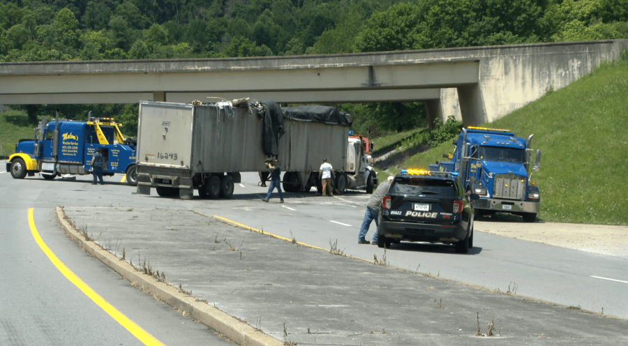 JCPD: Tractor-trailer blows two tires, flips after exiting Interstate 26