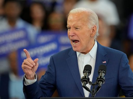 Biden shrugs off calls to exit presidential race as he takes aim at Trump’s ‘Project 2025’