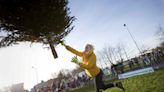 Woman loses £650,000 injury claim after being pictured winning Christmas tree-throwing contest