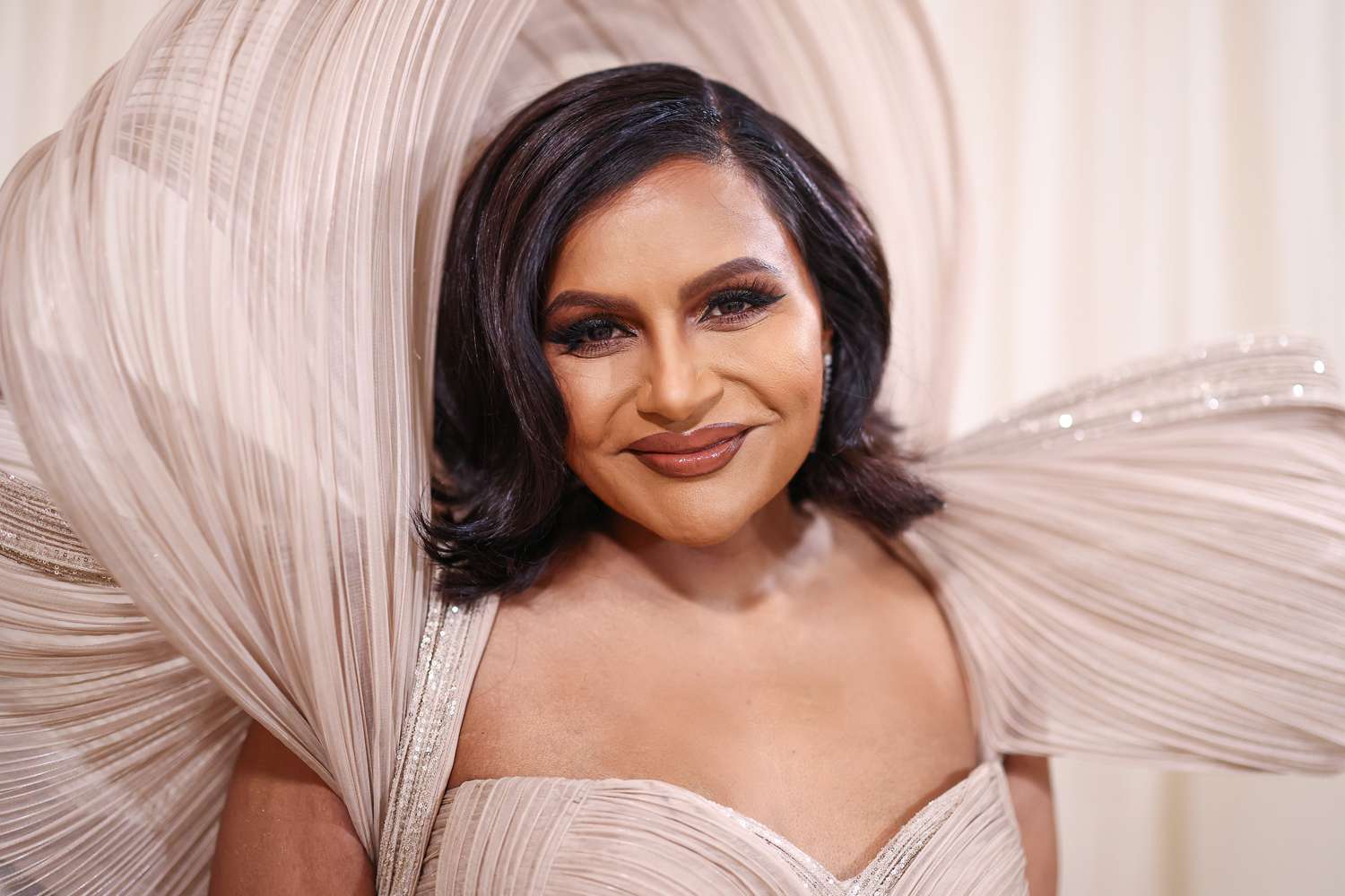 Mindy Kaling's Enormous Train at the 2024 Met Gala Requires Multiple Handlers on the Red Carpet