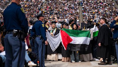 Small anti-war protest ruffles University of Michigan graduation ceremony