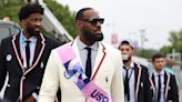 Flag bearers LeBron James and Coco Gauff get suited and booted