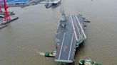 China's huge new aircraft carrier makes inaugural voyage as expert lays bare threat to US fleet