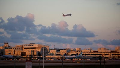 Miami airport stabbing: Woman stabbed, almost thrown off fourth-floor railing