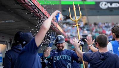 Cal Raleigh homers from each side of plate as Mariners rout Angels 11-0